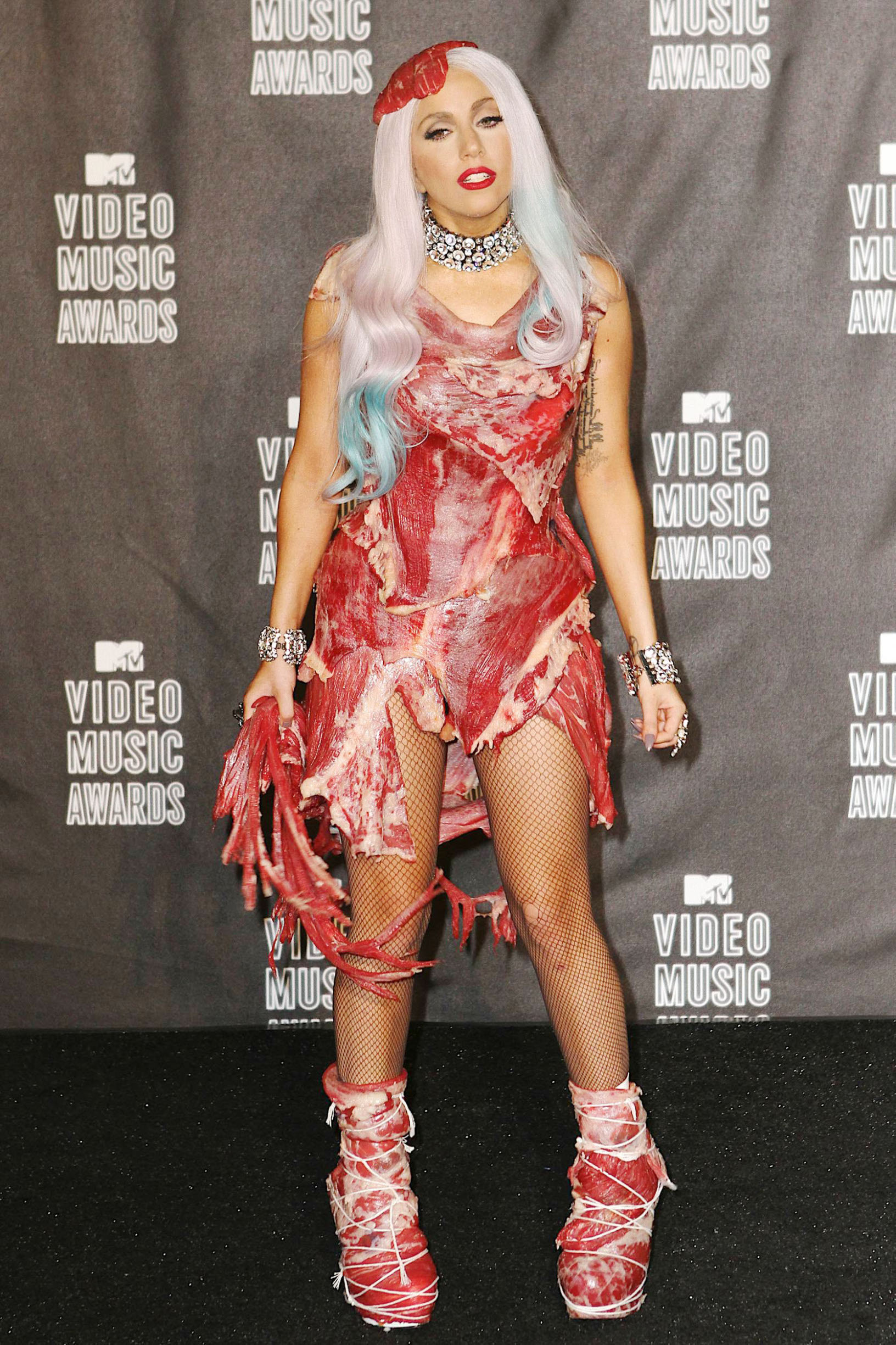 Lady Gaga adorned in her meat dress, boots and hat, backstage in the pressroom after the 2010 MTV Video Music Awards held at the Nokia Theatre.  Top prizes went to pop singer Gaga and teen sensation Justin Bieber. Los Angeles, CA.  09/12/10., Image: 79026042, License: Rights-managed, Restrictions: MAVRIXONLINE.COM 305 542 9275 or 954 698 6777.
Fees must be agreed for image use. Daily Mail Online Out.
Byline, credit, TV usage, web usage or linkback must read MAVRIXONLINE.COM.
Failure to byline correctly will incur double the agreed fee., Model Release: no, Credit line: laj / Mavrixphoto / Profimedia